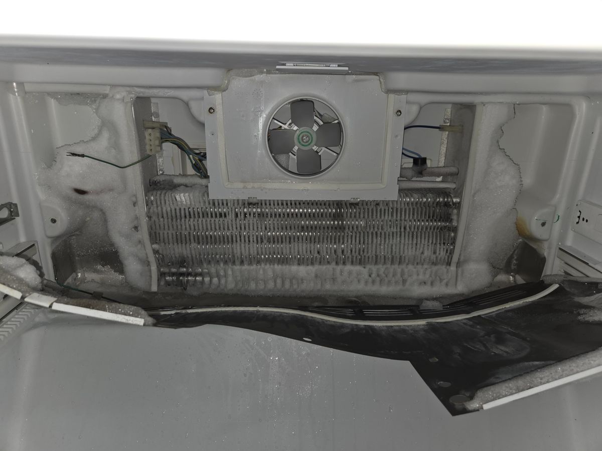 Freezer evaporator area open during a defrost-system repair